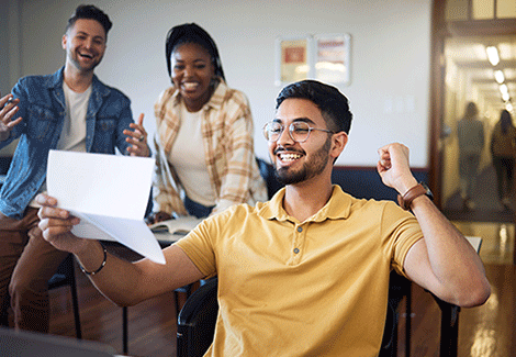 Man excited reading letter
